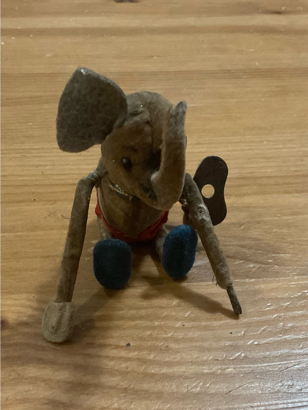 Schuco: unique Vintage Wind-Up tumbling Brown Elephant collectible Toy with key.